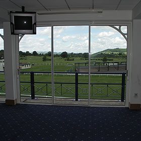 Internal view of windows looking out onto the racecourse